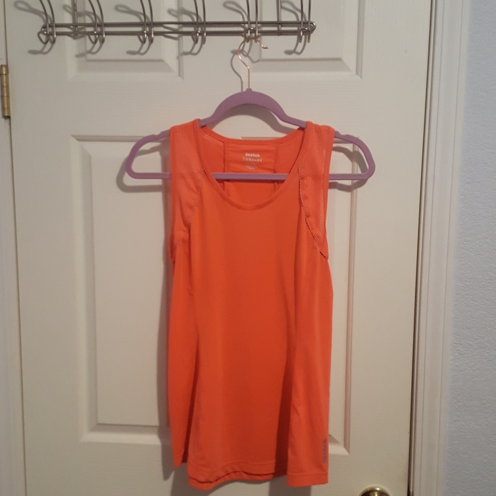 2 Reebok Tank tops. One orange and one black.